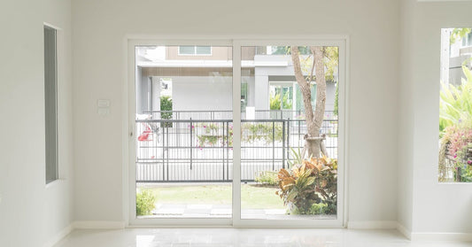 sliding glass patio door in an empty home